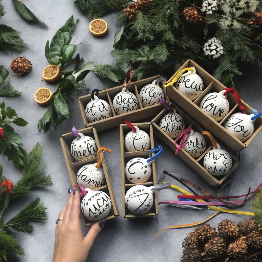 Personalised hand lettered ceramic Christmas baubles