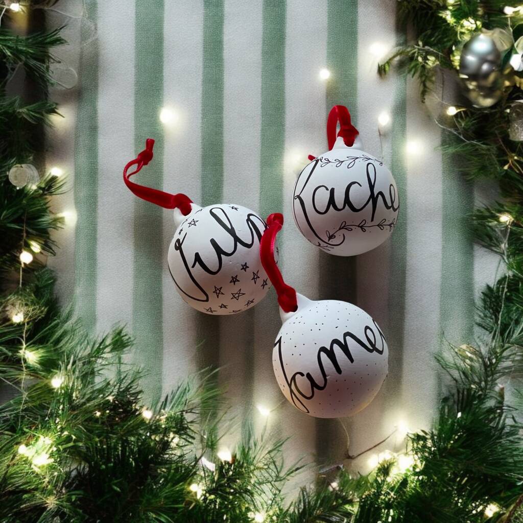 Personalised hand lettered ceramic Christmas baubles