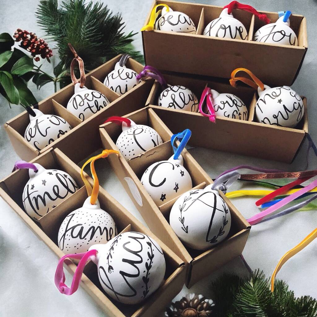 Personalised hand lettered ceramic Christmas baubles