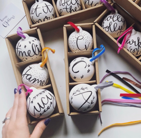 Personalised hand lettered ceramic Christmas baubles