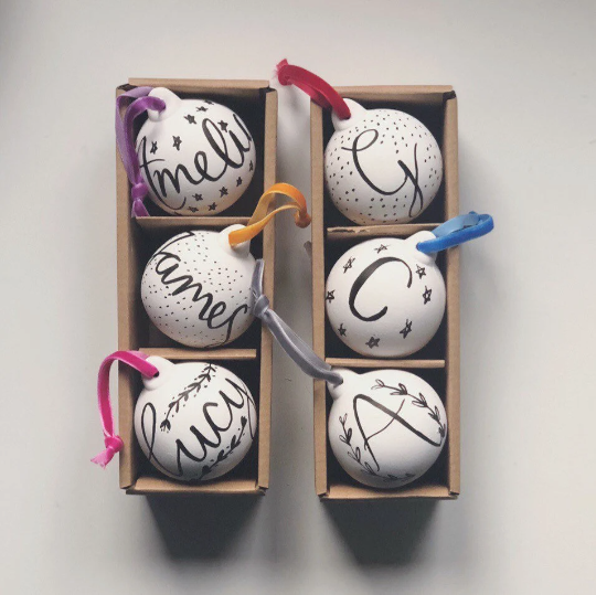 Personalised hand lettered ceramic Christmas baubles