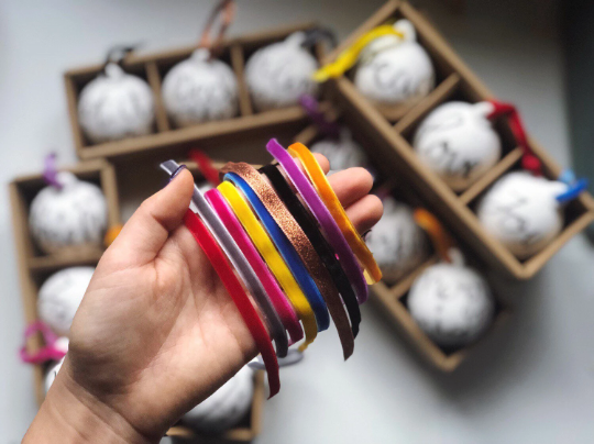 Personalised hand lettered ceramic Christmas baubles